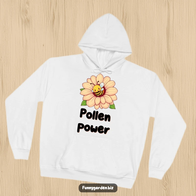 Funny Bee Flower Hoodie: Busy bee character buzzing energetically around a colossal flower, cozy and comical.