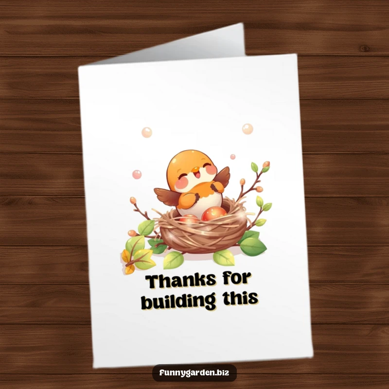 Free Printable Thank You Card: Adorable kawaii robin playfully building a nest with shiny, iridescent twigs, great for a downloadable thank you.